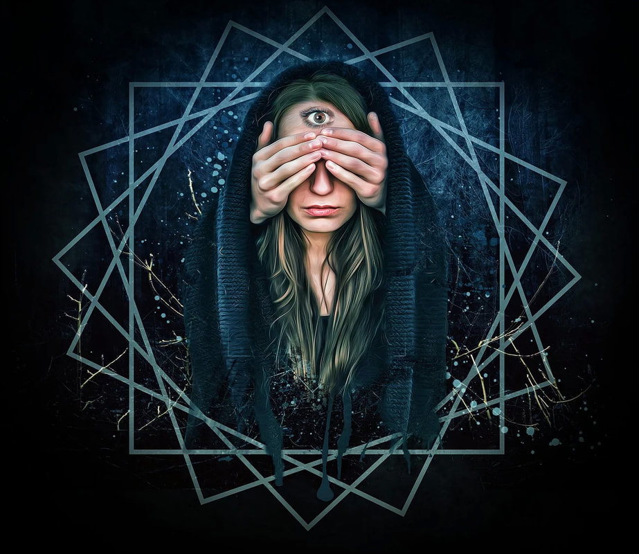 Woman with eyes covered and third eye open before eyebrows