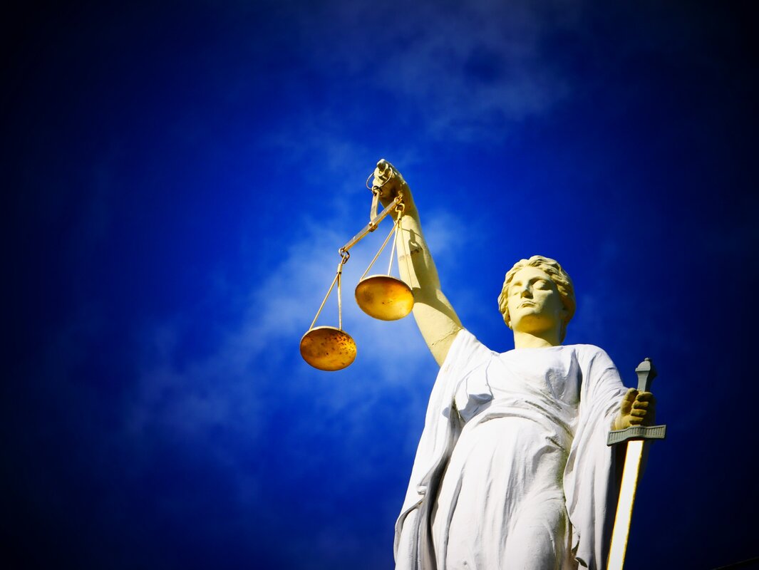 Lady justice with scale and swords