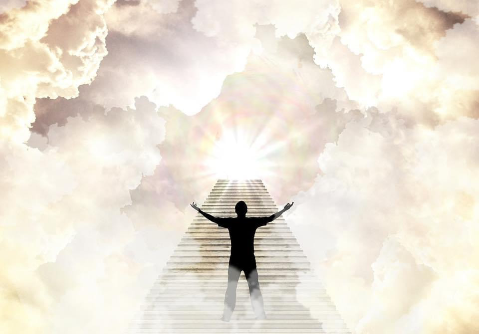 Ladder to heaven with silhouette of man