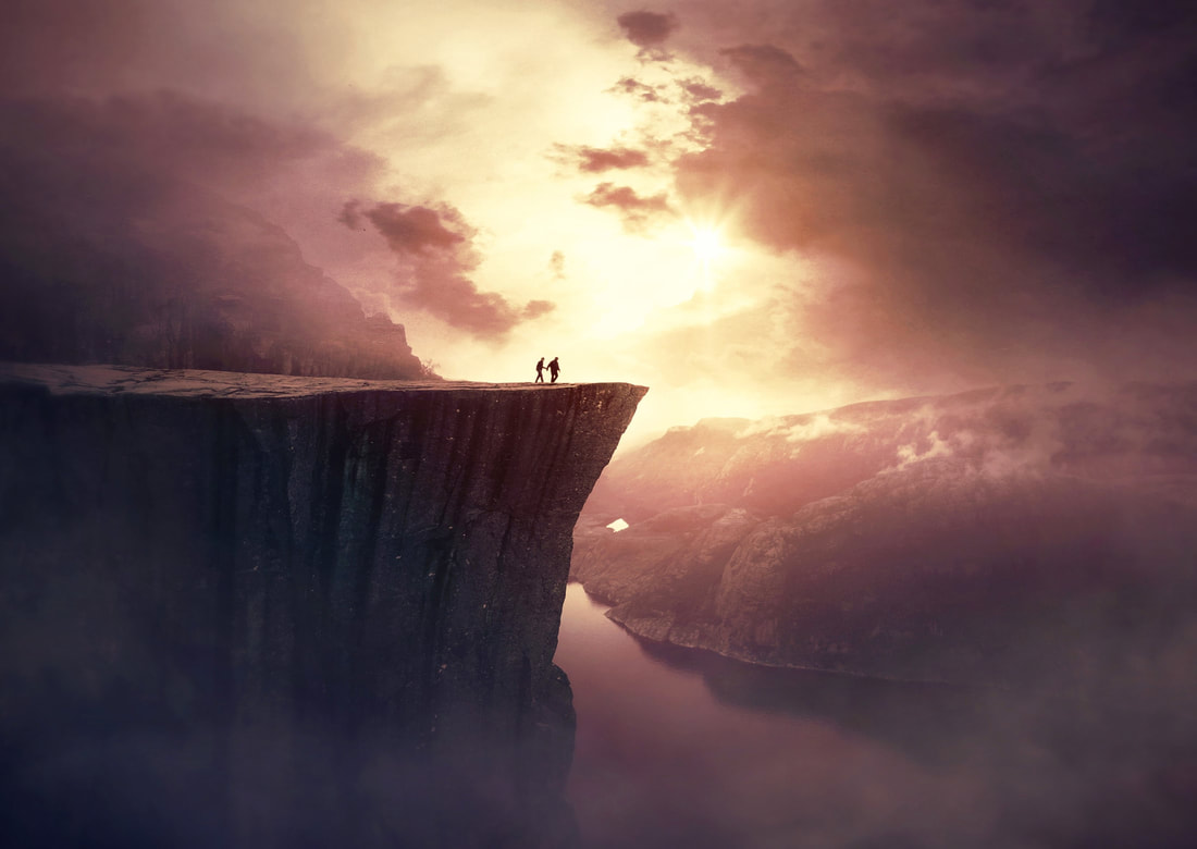 couple by a cliff