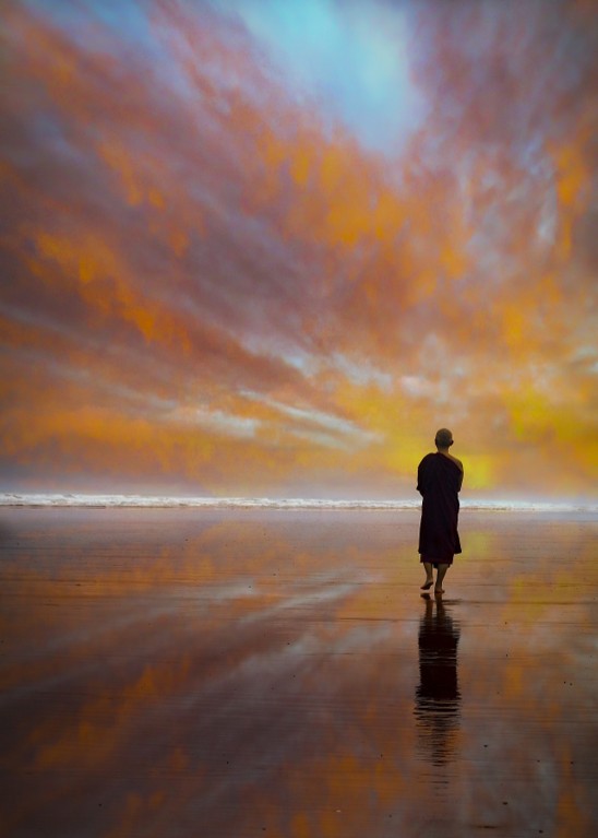 Monk on seashore